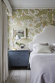 Christopher Farr Cloth Carnival in sky on the walls of a bedroom